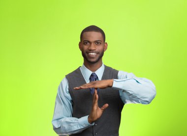 Executive man giving time out gesture with hands clipart