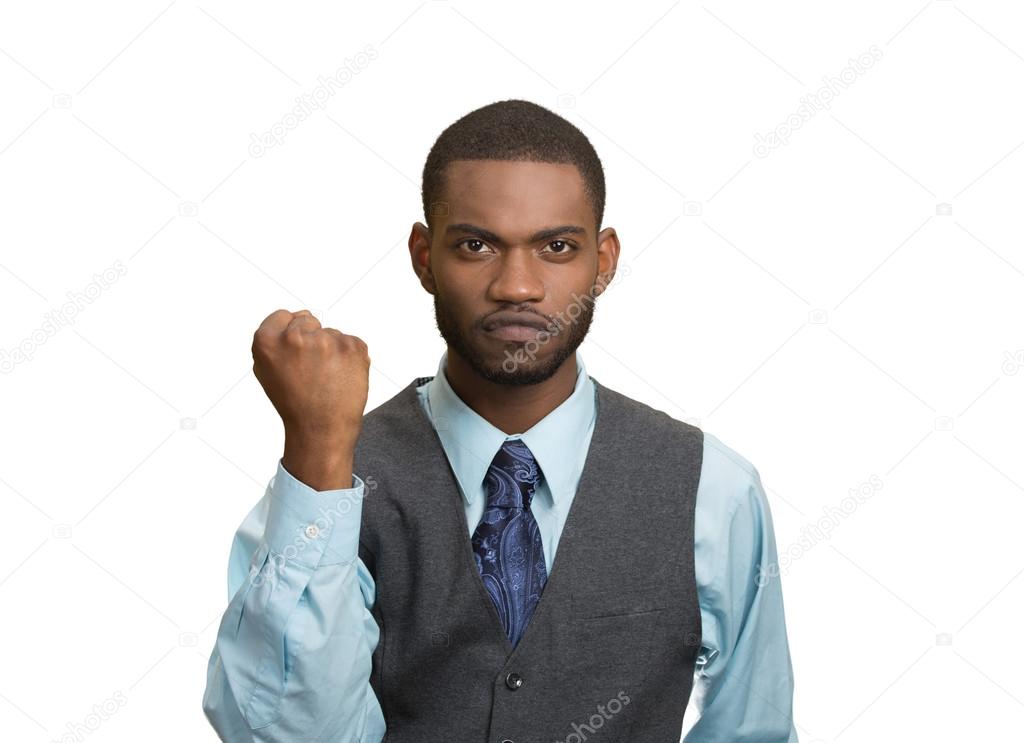 Angry man with fists up in air