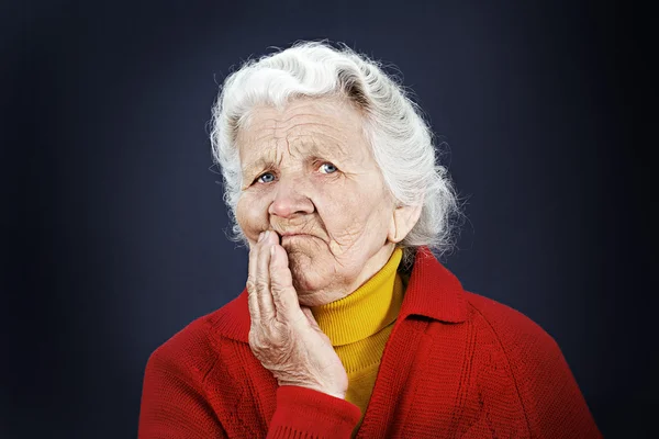 Skeptical old elderly woman — Stock Photo, Image