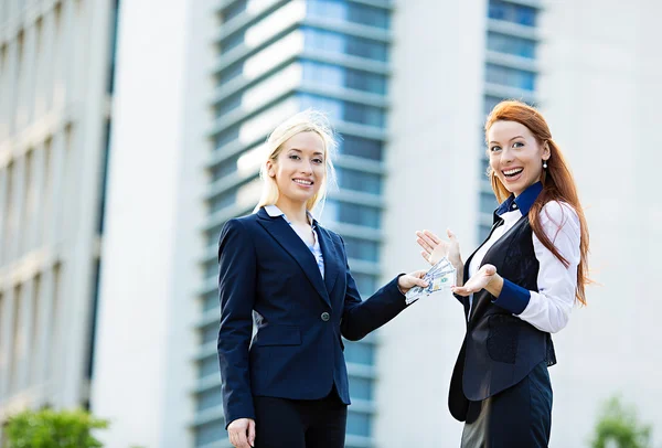 Banker gives money, cash to happy customer — Stock Photo, Image