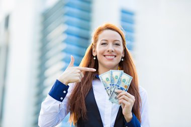 Happy woman holding dollar bills clipart