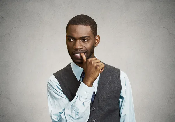 Anxious man biting his finger nails — Stock Photo, Image