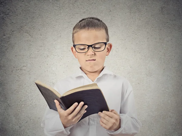 Unhappy Boy Reading Book — Stock Photo, Image