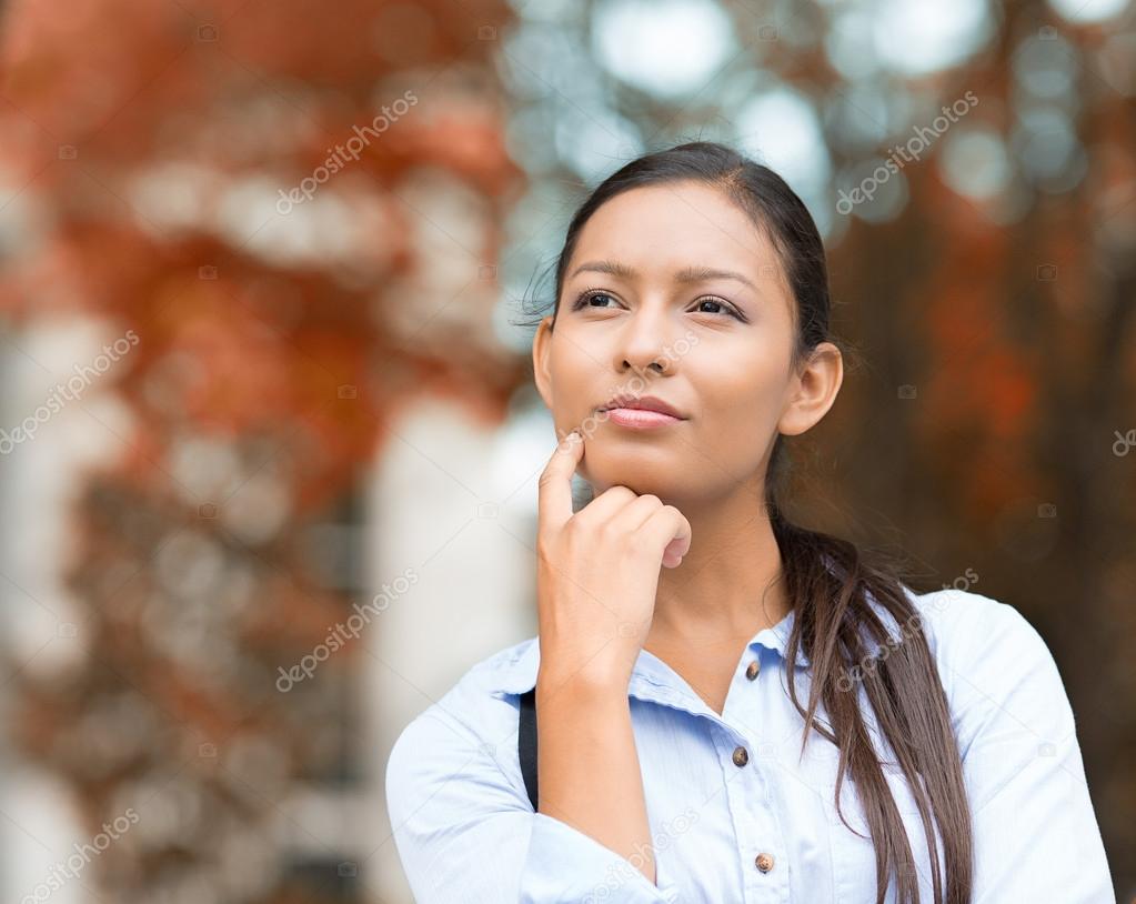 Young Businesswoman daydreaming, Thinking 