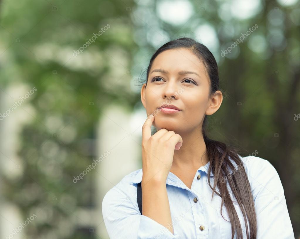 Young Businesswoman daydreaming, Thinking 