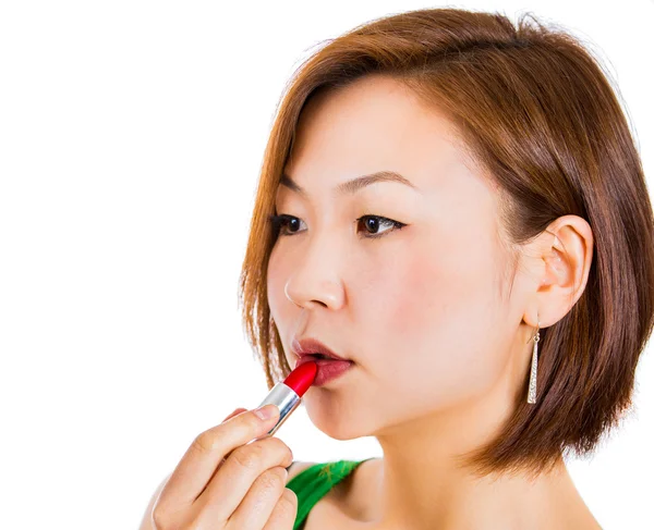 Woman applying lipstick — Stock Photo, Image