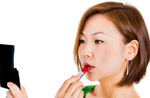 Woman applying lipstick — Stock Photo, Image