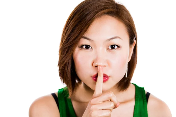 Secret woman with finger on lips — Stock Photo, Image