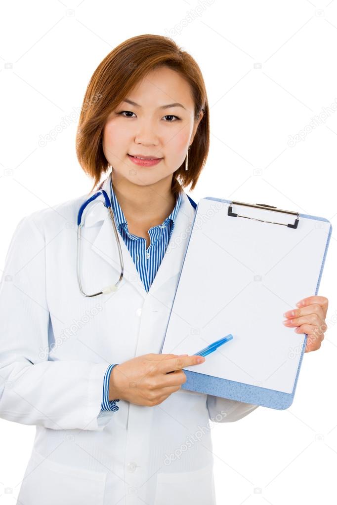 Doctor holding blank clipboard pointing with pen, offering to sign