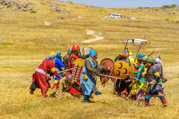 Lavi, Israel - July 01, 2022: Reenactment of the 1187 Battle of the Horns of Hattin (Ayyubid sultan Saladin defeated the crusaders): Infantry fight. Horns of Hattin, Israel
