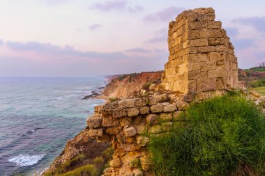 Sunset view of the crusader fortress and the Mediterranean Sea coast, in Apollonia National Park, Herzliya, central Israel