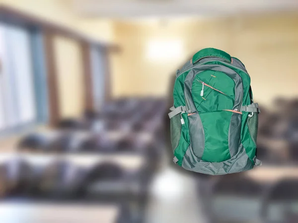Green School Bag Isolated Blur Classroom View — Stock Photo, Image