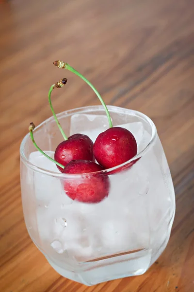 Cup of ice and cherries — Stock Photo, Image