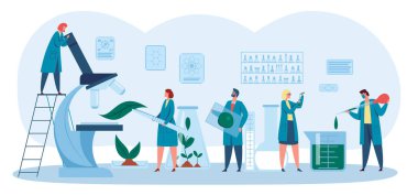 Biyologlar laboratuvarda araştırma ve inceleme yapıyorlar.