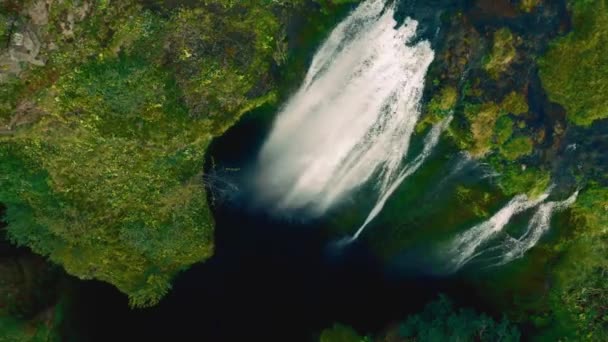Panoramic flight from the bowels of famous waterfall Gljufrabui in Iceland — Stock Video