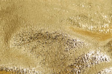 Altın glitter dokulu arka planı kapat