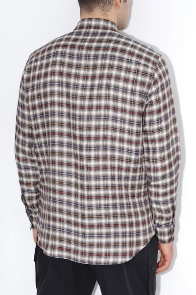 Classic shirt of black silk with long sleeves and pockets on chest in half turn front, side and back