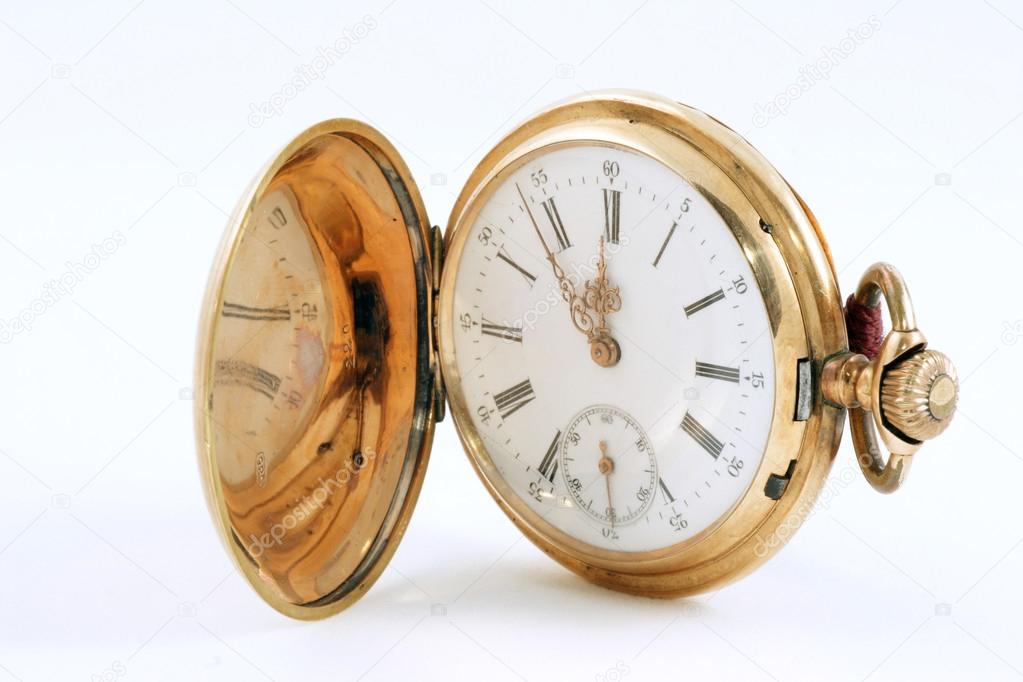 Pocket watch in a gold case on a white background, zoom