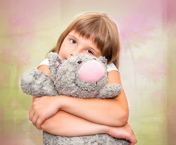 Girl dreaming with toy cat — Stock Photo, Image