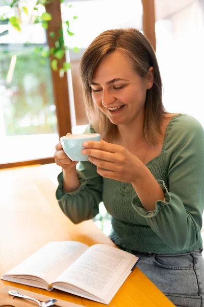 Happy Woman Drinking Coffee Reading Her Favorite Book Cafe Woman — Foto de Stock