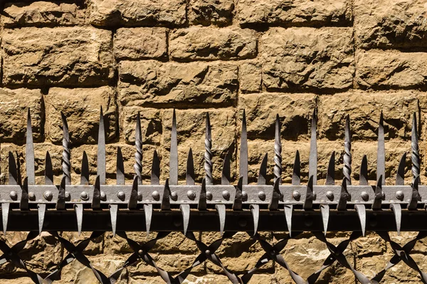 Closeup view of impressive forged tines  in a security barrier — Stock Photo, Image