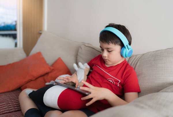 Happy Young Boy Wearing Headphone Playing Game Internet Friends Child Royalty Free Stock Photos