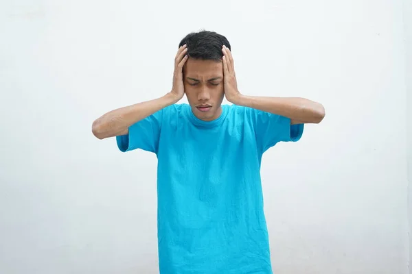 Portrait Asian Young Man Wearing Blue Shirt Suffering Severe Headache — стоковое фото