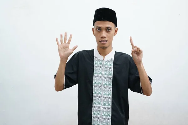 Asian Muslim Man Wearing Casual Wear Showing Pointing Finger Number — стоковое фото