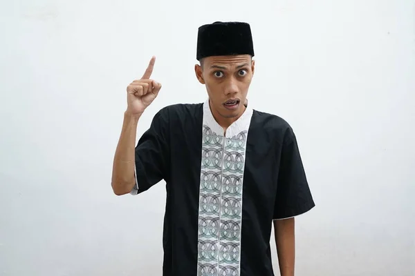 Portrait Asian Young Man Wearing Muslim Shirt Hat Holding His — Fotografia de Stock