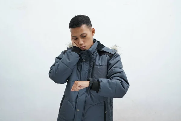 Asian Man Wearing Winter Jacket Isolated White Background Looking Watch — Fotografia de Stock