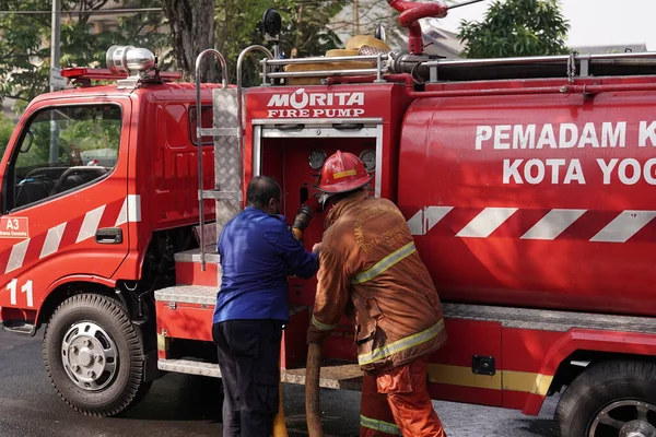 Firefighters Standby Trying Extinguish Fire Furniture Warehouse Fire Site Yogyakarta — стокове фото