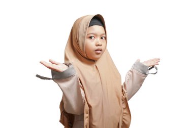 girls wearing hijab muslim clothes, confused concept and don't understand. Shrugging, said: who cares, so what, I don't know. isolated on a white background