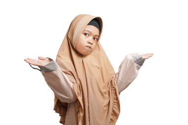 girls wearing hijab muslim clothes, confused concept and don't understand. Shrugging, said: who cares, so what, I don't know. isolated on a white background