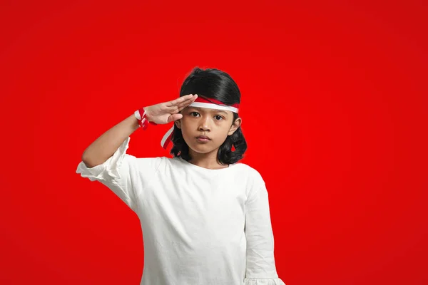 Isolated Girl Wearing Red White Ribbon Celebrates Indonesia Independence Saluting — Stockfoto