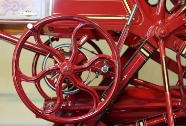 Vintage fire engine detailed photo. Beautiful red vehicle close up photo. 