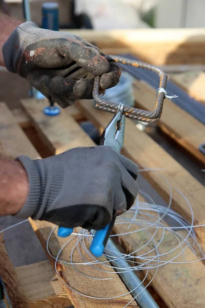 Close Photo Man Holding Pliers Man Works Reinforcement Steel Construction — Stock Fotó