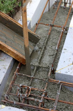 Concrete work in process. Cement foundation close up photo. Construction site photo. 