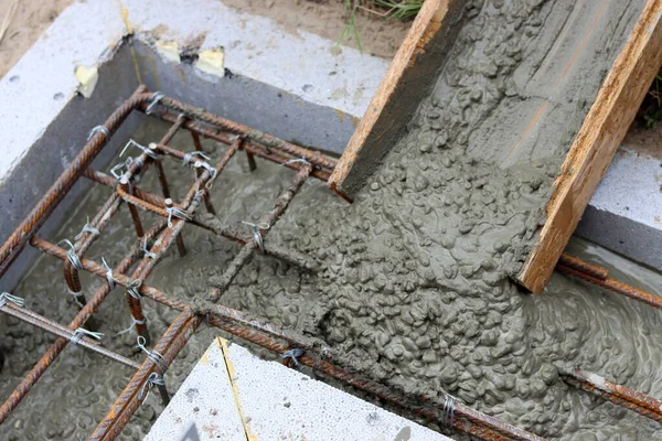 Concrete work in process. Cement foundation close up photo. Construction site photo.