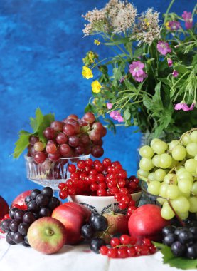 Fresh summer fruit and berry on a table. Natural antioxidants. Healthy eating concept. 