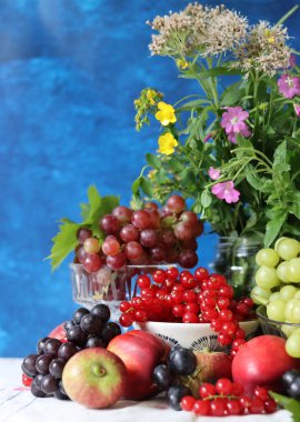 Still life with grapes. Fresh organic fruit on a table. Vitamins and antioxidants concept. Healthy eating. 