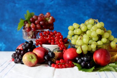 Fresh summer fruit and berry on a table. Natural antioxidants. Healthy eating concept. 