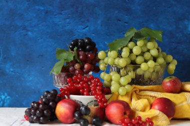 Fresh summer fruit and berry on a table. Natural antioxidants. Healthy eating concept. 
