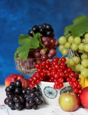 Fresh summer fruit and berry on a table. Natural antioxidants. Healthy eating concept. 