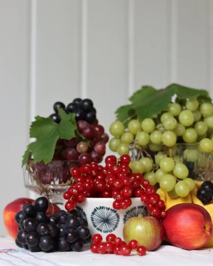 Fresh summer fruit and berry on a table. Natural antioxidants. Healthy eating concept. 