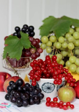 Fresh summer fruit and berry on a table. Natural antioxidants. Healthy eating concept. 