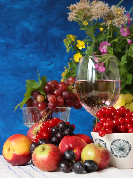 Fresh summer fruit and berry on a table. Natural antioxidants. Healthy eating concept. 