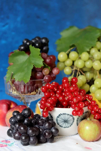 Still life with grapes. Fresh organic fruit on a table. Vitamins and antioxidants concept. Healthy eating. 