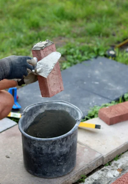 Close Photo Male Hands Holding Red Brick Construction Site Concept — Stok Foto