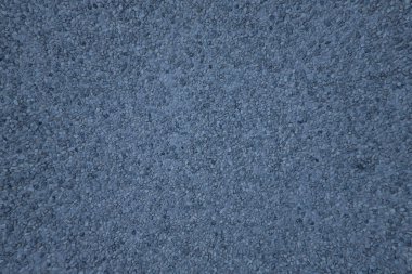 Küçük beyaz, siyah ve gri granit taşlardan yapılmış duvar dokusu. Konsept dokusu, gri, kopyalama alanı.