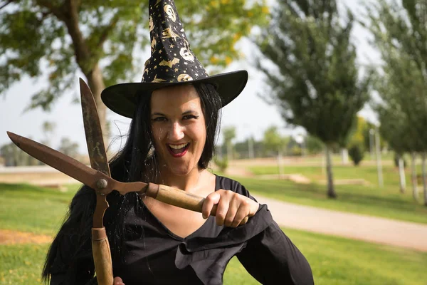 Woman Black Witch Suit Hat Huge Pruning Shears Hands Evil — Fotografia de Stock